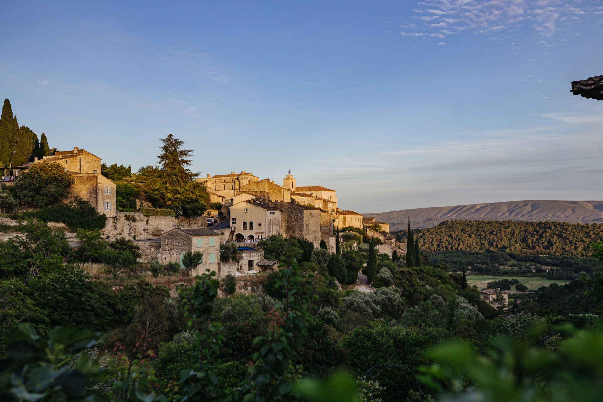 Hilltop village of Gordes at golden hour in Provence — Grange de Javon wedding