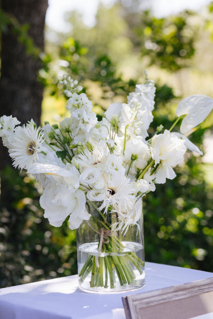 White floral arrangement at the reception — Grange de Javon wedding