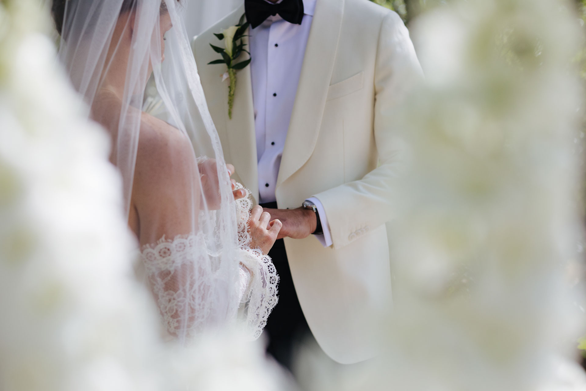 Intimate moment between bride and groom at the altar — Grange de Javon, Provence