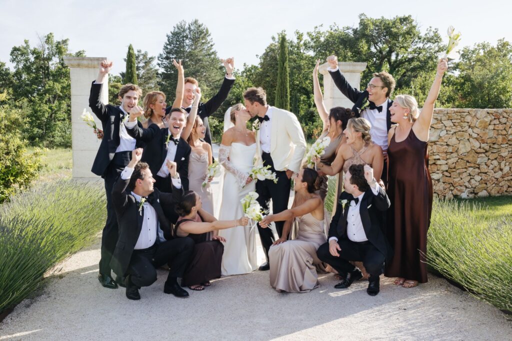 Wedding party cheering after the ceremony — Grange de Javon, Provence