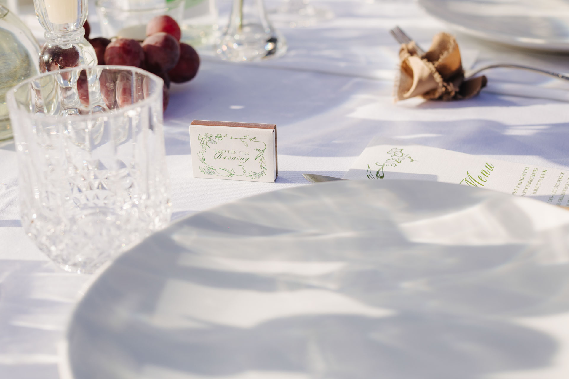Provencal table setting with figs and place cards — Grange de Javon wedding