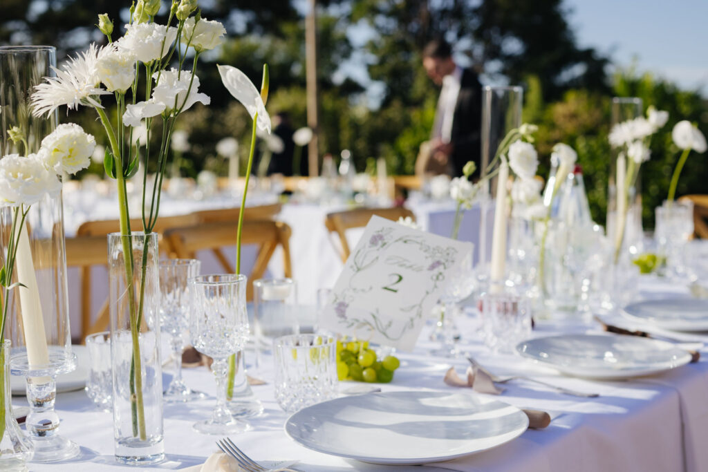 Reception table dressed with white flowers — Grange de Javon, Provence