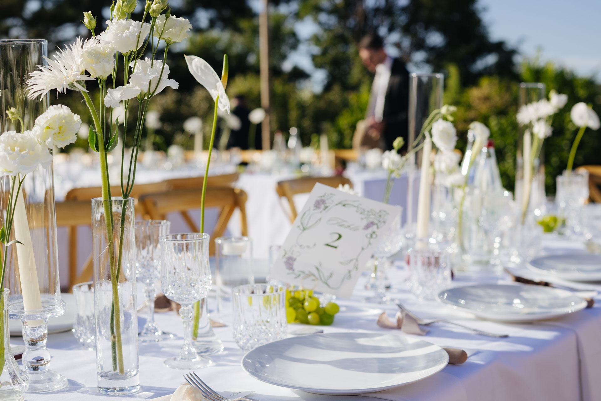 Reception table dressed with white flowers — Grange de Javon, Provence