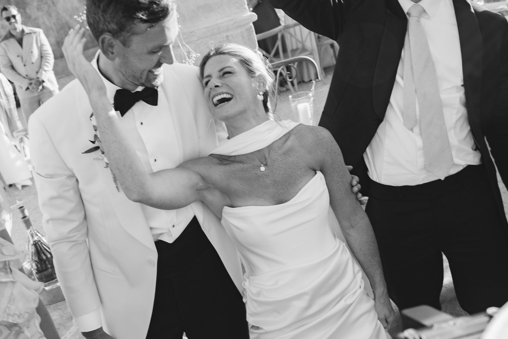 Bride and groom laughing on the dance floor — Grange de Javon, Provence