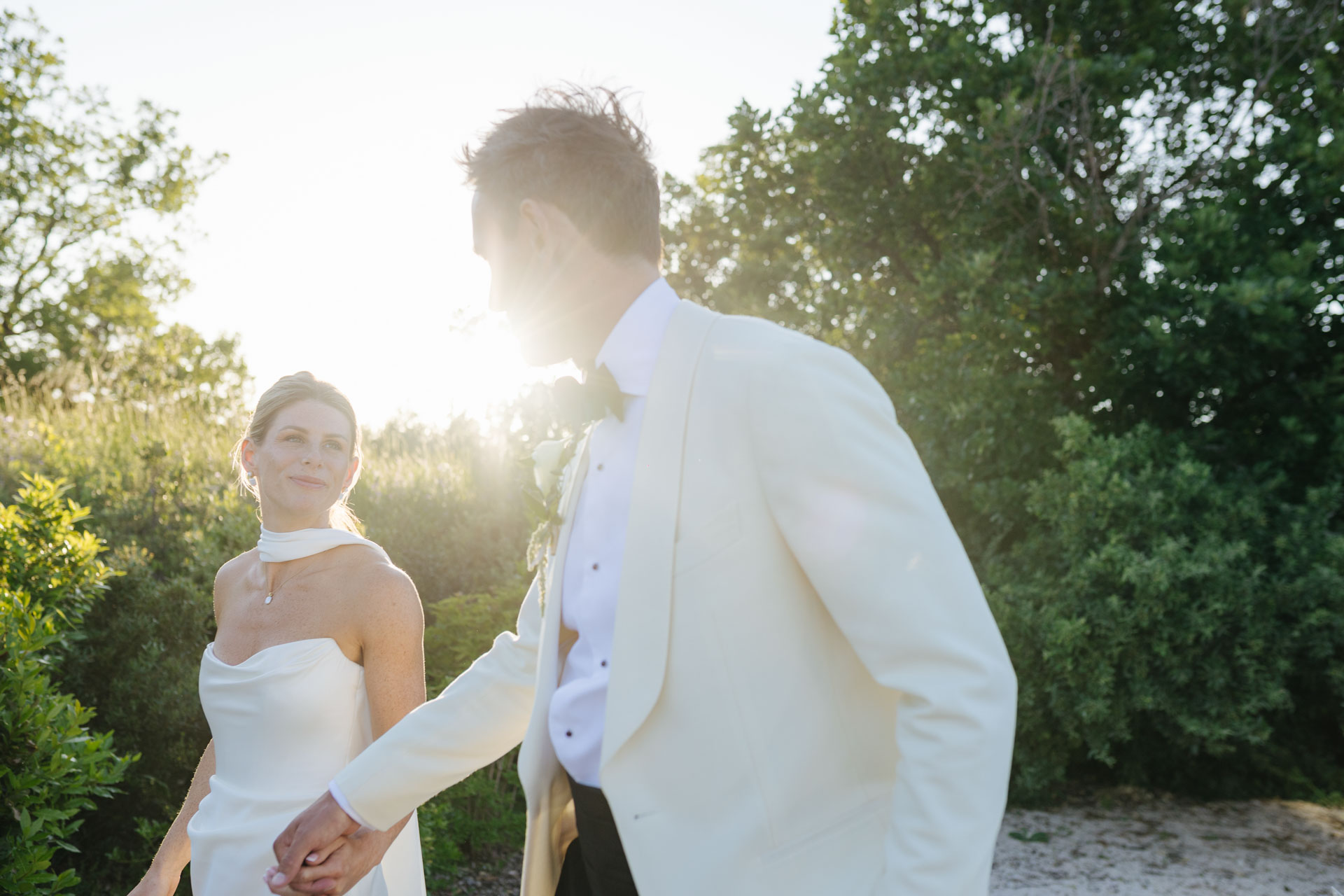Bride and groom in soft golden-hour light — Grange de Javon wedding
