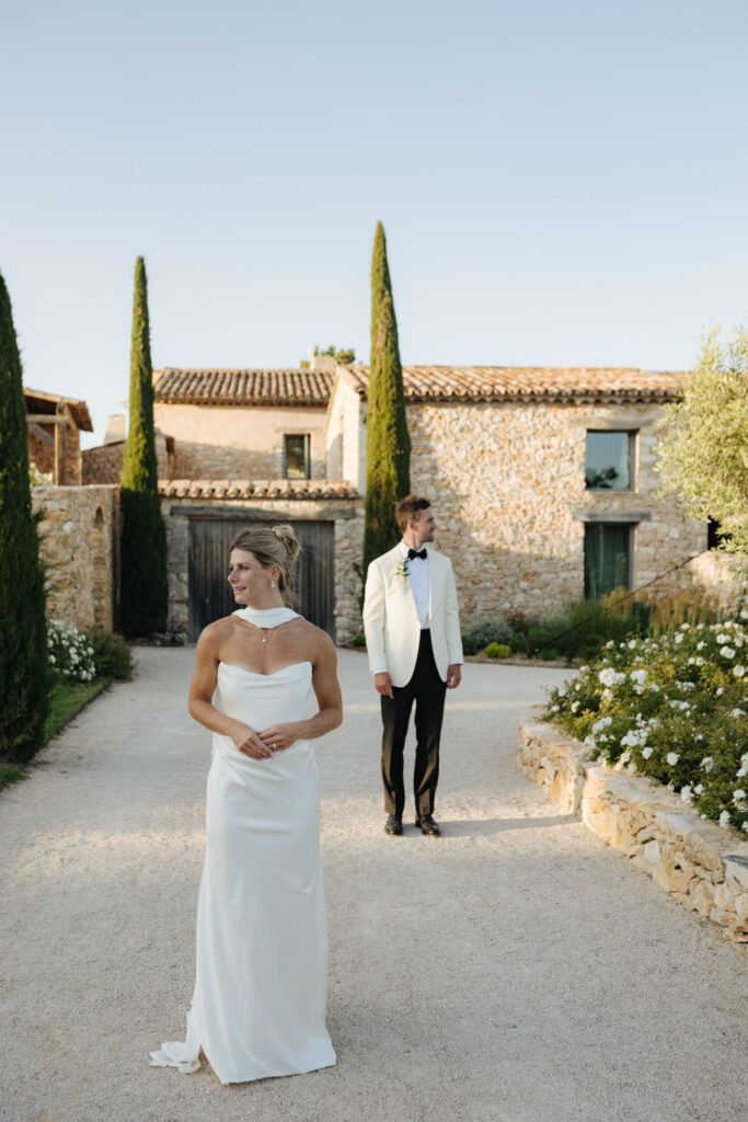 Bride and groom couple portrait outside the venue — Grange de Javon, Provence