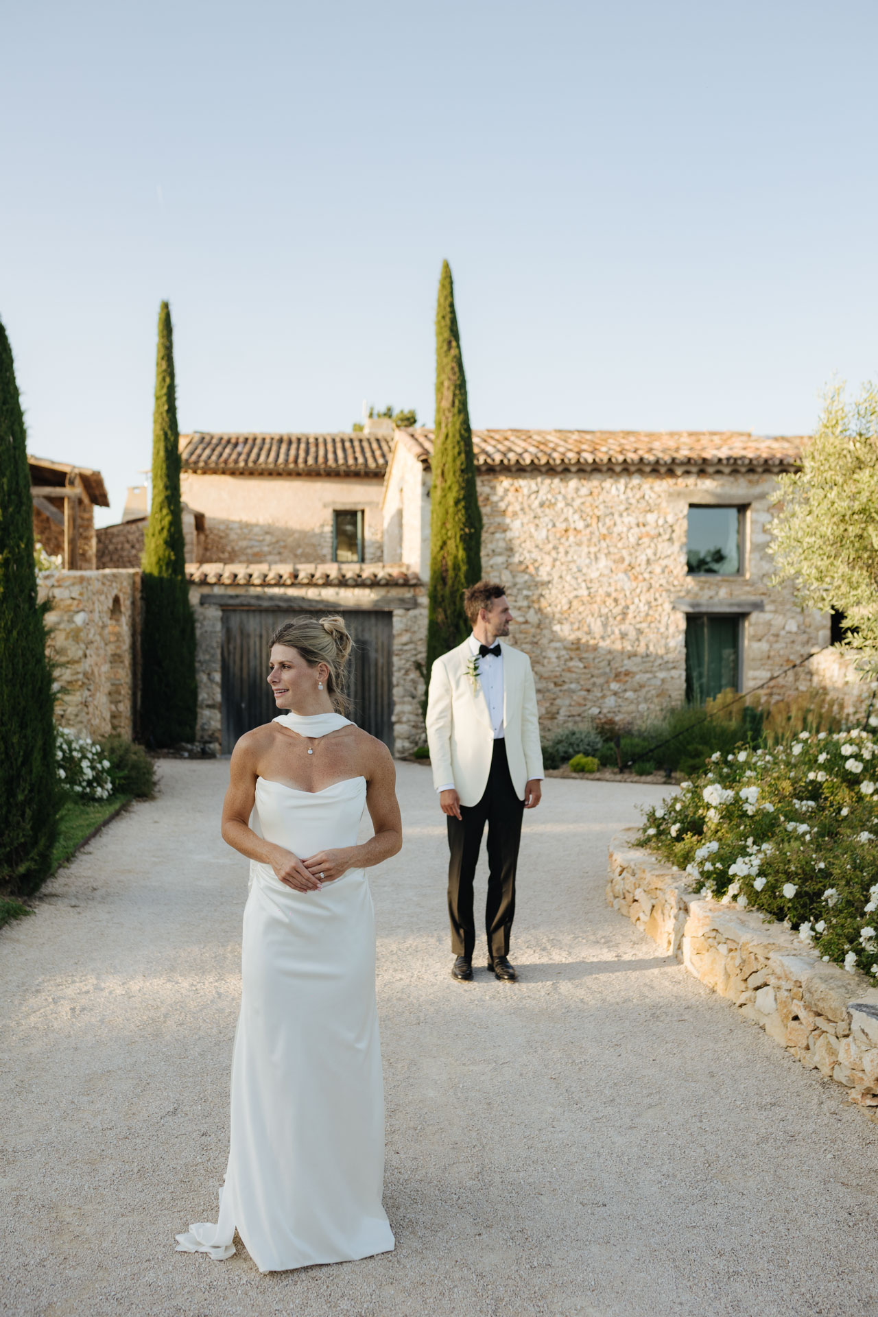 Bride and groom couple portrait outside the venue — Grange de Javon, Provence