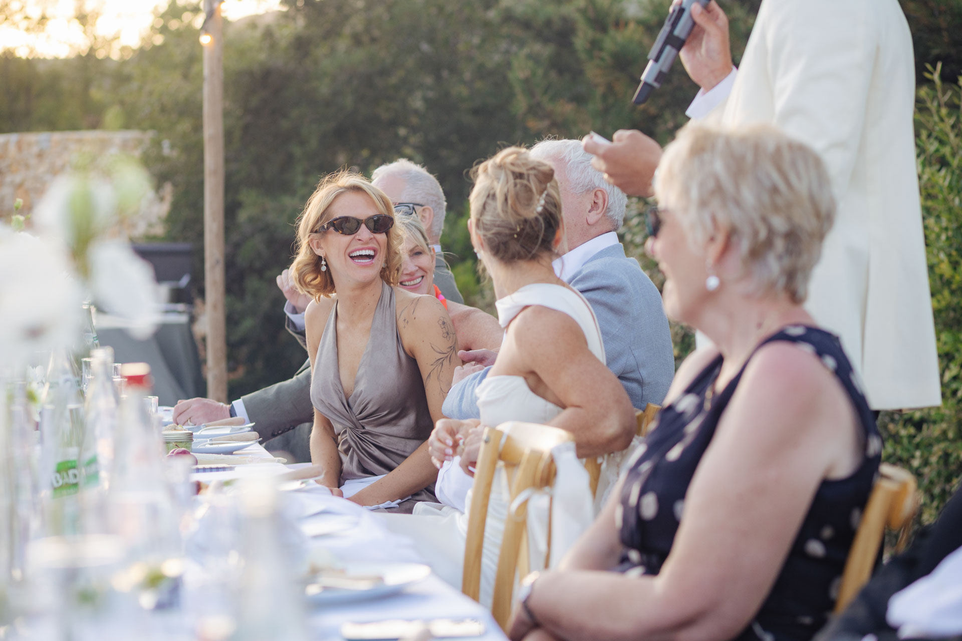 Guests enjoying the al fresco wedding dinner — Grange de Javon wedding