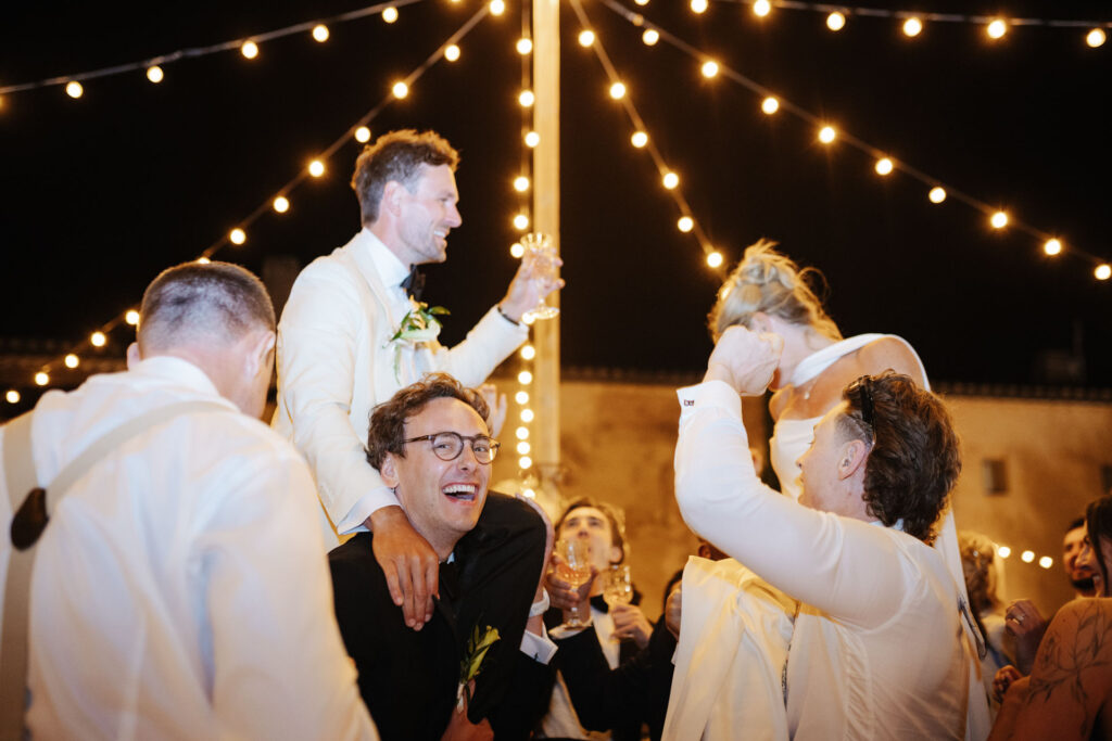 Dancing under string lights at the reception — Grange de Javon wedding