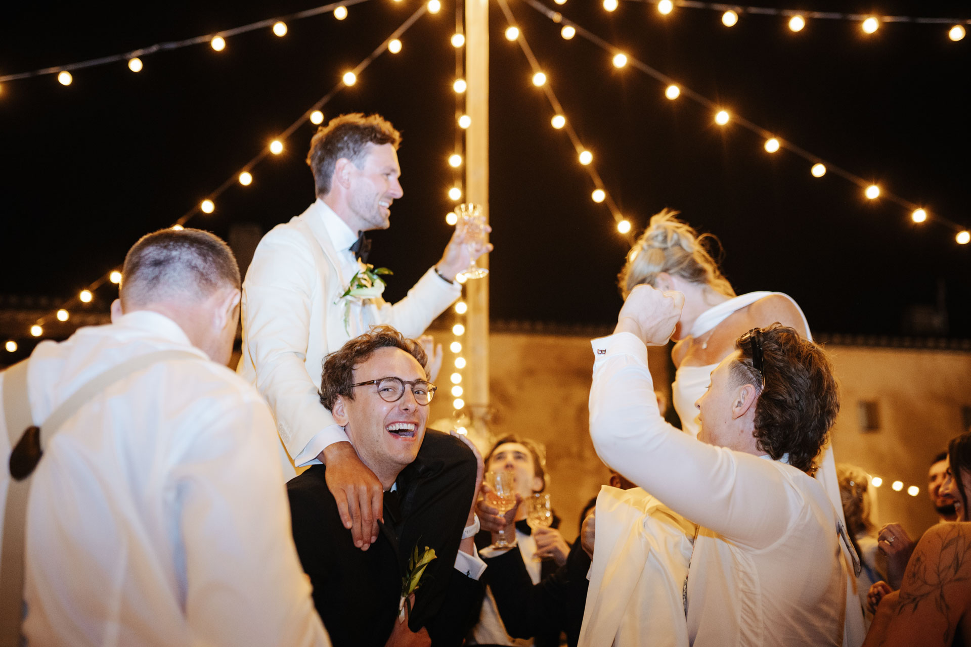 Dancing under string lights at the reception — Grange de Javon wedding