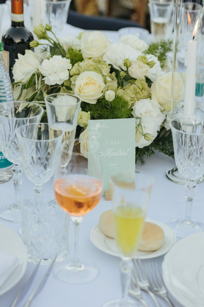Aperitivo table details, spritz, fresh bread, and candlelight