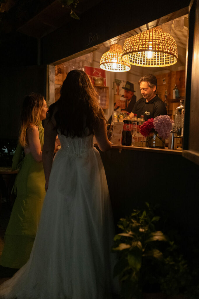 Late-night bar scene during the Villa Buonvisi wedding